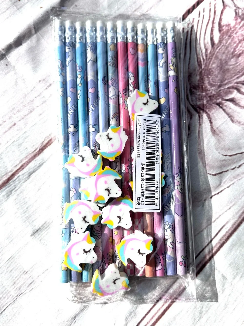 12 Rainbow Unicorn Pencil Set with Pastel Designs and Eraser Toppers